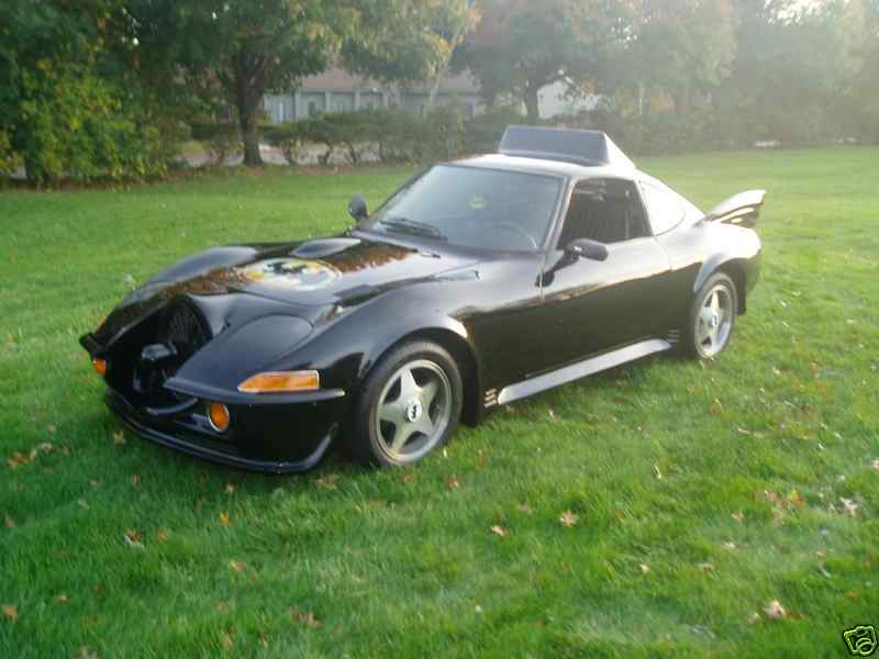 Illustration for article titled Nice Price Or Crack Pipe: Opel GT Batmobile For $9000?